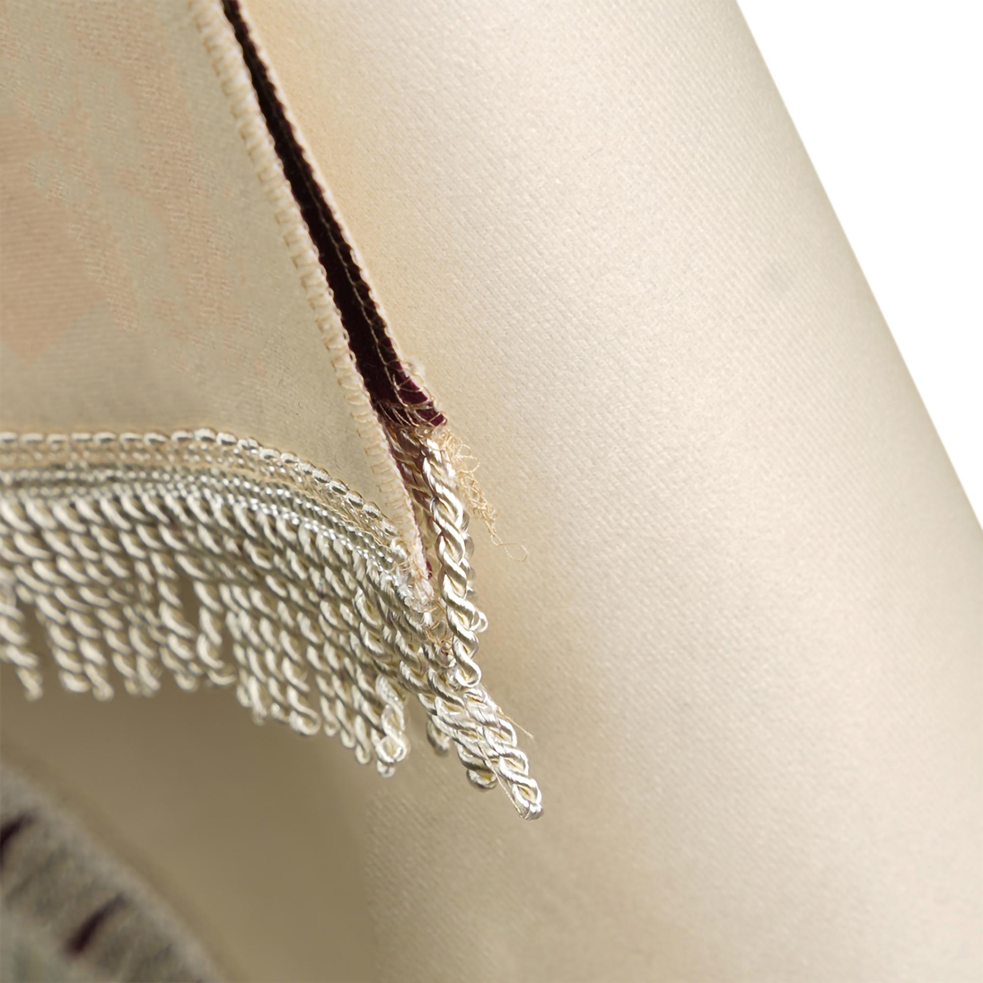 close-up of metallic thread embroidery